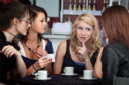 simsearch:400-04238163,k - Young cute girls sharing a secret in a cafe Stock Photo - Budget Royalty-Free & Subscription, Code: 400-04267278