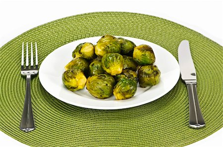 simsearch:400-06429494,k - Plate of green brussels sprouts with knife and fork Stock Photo - Budget Royalty-Free & Subscription, Code: 400-04268250