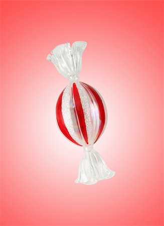 simsearch:400-07449438,k - Colourful lollipop isolated on the red background Stock Photo - Budget Royalty-Free & Subscription, Code: 400-04268310