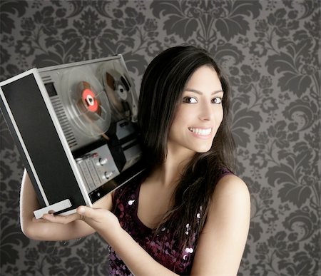 funky old lady - Retro open reel tape recorder beautiful brunette Dj hearing music gray walpaper Stock Photo - Budget Royalty-Free & Subscription, Code: 400-04269397