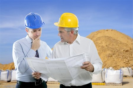 simsearch:400-04616755,k - architect engineer two expertise team plan talking hardhat quarry sand sacks blue sky Stock Photo - Budget Royalty-Free & Subscription, Code: 400-04269652