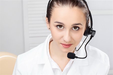 simsearch:400-03914864,k - woman with headset and close up shoot over white background Stock Photo - Budget Royalty-Free & Subscription, Code: 400-04269906