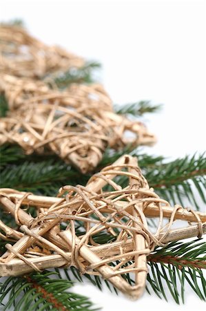 simsearch:400-04749446,k - Christmas arrangement with gold stars and spruce twigs isolated on white background. Shallow dof Foto de stock - Super Valor sin royalties y Suscripción, Código: 400-04260908