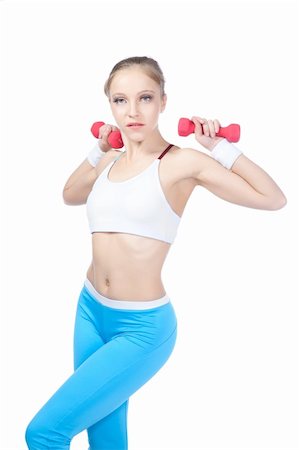 female natural biceps - beautiful woman  in fitness over white background Stock Photo - Budget Royalty-Free & Subscription, Code: 400-04260945