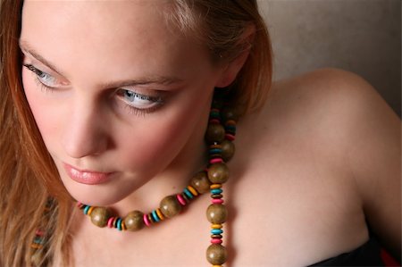 simsearch:400-04266572,k - Beautiful female model with blue eyes and a string beads Stock Photo - Budget Royalty-Free & Subscription, Code: 400-04261246