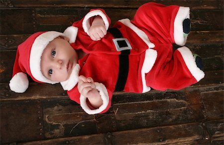 family relaxing at christmas - Cute 6 week old baby boy in christmas suit Stock Photo - Budget Royalty-Free & Subscription, Code: 400-04261789