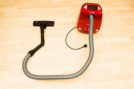 suzione - Vacuum cleaner on the wooden floor Fotografie stock - Microstock e Abbonamento, Codice: 400-04261909
