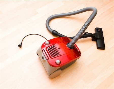 sucio - Vacuum cleaner on the wooden floor Stock Photo - Budget Royalty-Free & Subscription, Code: 400-04261912