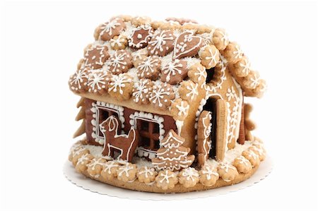 Christmas gingerbread house isolated on white background. Shallow dof Stock Photo - Budget Royalty-Free & Subscription, Code: 400-04262106