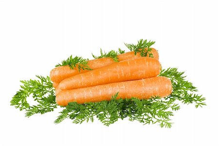 simsearch:400-07982459,k - Carrots stacket up with leaves around on white background Photographie de stock - Aubaine LD & Abonnement, Code: 400-04263136