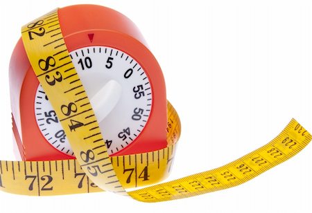 Measuring tape around a kitchen timer suggests that it is about time to get on a diet.  Also works for sewing themed images.  Isolated on white with a clipping path. Stock Photo - Budget Royalty-Free & Subscription, Code: 400-04263208