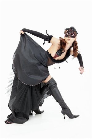 simsearch:400-05192783,k - Dancing woman in the sexual black suit, isolated Fotografie stock - Microstock e Abbonamento, Codice: 400-04263394
