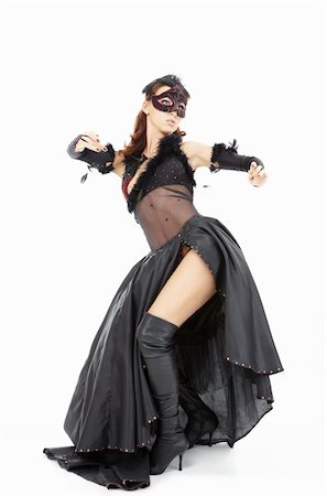 simsearch:400-08264249,k - Dancing woman in a mask and the black dress, isolated Stock Photo - Budget Royalty-Free & Subscription, Code: 400-04263391