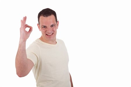 simsearch:400-04775272,k - handsome man with arm raised in ok sign, isolated on white background. Studio shot Photographie de stock - Aubaine LD & Abonnement, Code: 400-04274584