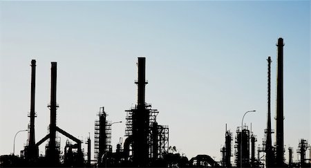 Silhouette of an oil refinery with pipes and chimneys Stock Photo - Budget Royalty-Free & Subscription, Code: 400-04275140