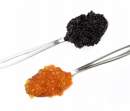 desovar - Red and black caviar on two spoons, view from above, isolated on white. Foto de stock - Super Valor sin royalties y Suscripción, Código: 400-04275176