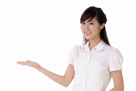 elwynn (artist) - Business woman showing with hand on white space. Stock Photo - Budget Royalty-Free & Subscription, Code: 400-04275249