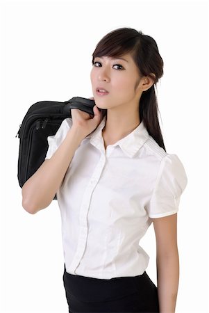 Attractive business woman with briefcase on shoulder against white background. Stock Photo - Budget Royalty-Free & Subscription, Code: 400-04275257