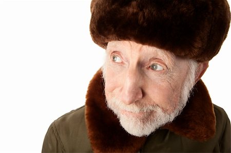 simsearch:400-04227846,k - Senior Russian Man in Fur Cap and jacket Fotografie stock - Microstock e Abbonamento, Codice: 400-04275270