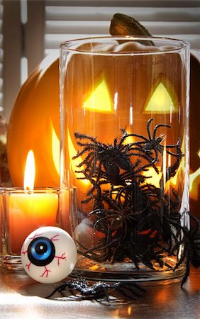 Decorative spiders in glass container for Halloween Stock Photo - Budget Royalty-Free & Subscription, Code: 400-04275433