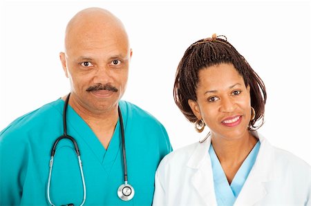 plaited hair for men - Head and shoulders portrait of caring, african-american doctors.  Isolated on white. Photographie de stock - Aubaine LD & Abonnement, Code: 400-04275704