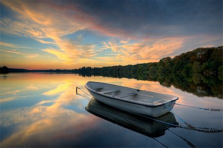 rowboat fog pictures - sunset at the lake a quiet evening with calm water Stock Photo - Budget Royalty-Free & Subscription, Code: 400-04275742