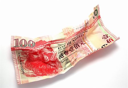 One wrinkled Hong Kong dollar on white backgroun Stock Photo - Budget Royalty-Free & Subscription, Code: 400-04276060