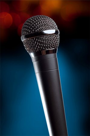 stage microphone nobody - microphone on the blue bokeh background Stock Photo - Budget Royalty-Free & Subscription, Code: 400-04276127