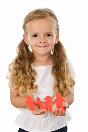 simsearch:400-05879764,k - Little girl holding paper people family - happiness concept, isolated Foto de stock - Super Valor sin royalties y Suscripción, Código: 400-04276227