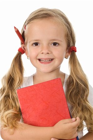 simsearch:400-04131892,k - Little schoolgirl portrait with books and pencil behind the ear - isolated, closeup Stockbilder - Microstock & Abonnement, Bildnummer: 400-04276223