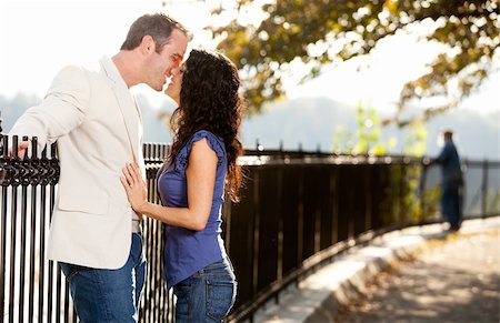 friendship proposal to girl pic - A happy couple in love kissing in the park Stock Photo - Budget Royalty-Free & Subscription, Code: 400-04277310