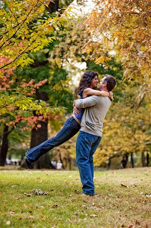 A man and woman hugging in a park Stock Photo - Budget Royalty-Free & Subscription, Code: 400-04277339