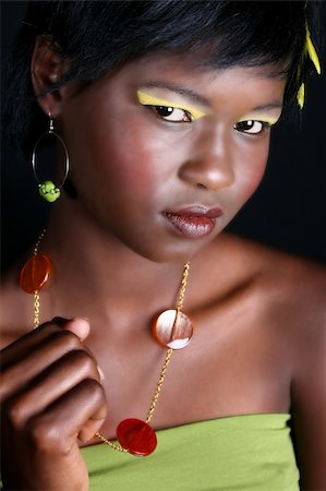 Beautiful young African female model with accessories Stock Photo - Budget Royalty-Free & Subscription, Code: 400-04277960