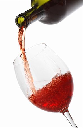 simsearch:400-04279337,k - Pouring red wine into a glass isolated on white Foto de stock - Super Valor sin royalties y Suscripción, Código: 400-04278837