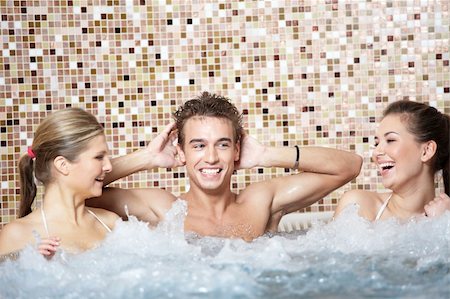 female jacuzzi modeling - Laughing young men are in a jacuzzi Stock Photo - Budget Royalty-Free & Subscription, Code: 400-04278882
