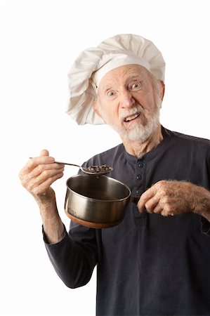 simsearch:400-04227846,k - Funny senior chef with big white hat and pot of beans Fotografie stock - Microstock e Abbonamento, Codice: 400-04278946