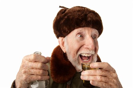 simsearch:400-04227846,k - Senior Russian Man in Fur Cap and Jacket with Vodka Fotografie stock - Microstock e Abbonamento, Codice: 400-04278950