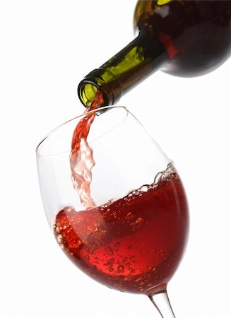 simsearch:400-04279337,k - Pouring red wine into a glass isolated on white Foto de stock - Super Valor sin royalties y Suscripción, Código: 400-04279346