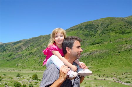 Explorer mountain little girl and father in green outdoor valley landscape Photographie de stock - Aubaine LD & Abonnement, Code: 400-04279679