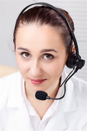 simsearch:400-03914864,k - woman with headset and close up shoot over white background Stock Photo - Budget Royalty-Free & Subscription, Code: 400-04270630