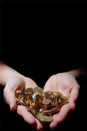 simsearch:400-07123052,k - hands with money coins on a black background Stock Photo - Budget Royalty-Free & Subscription, Code: 400-04270686