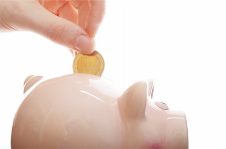 piggy bank hand - piggy bank or piggybank with hand isolated on white background showing savings concept Stock Photo - Budget Royalty-Free & Subscription, Code: 400-04270719