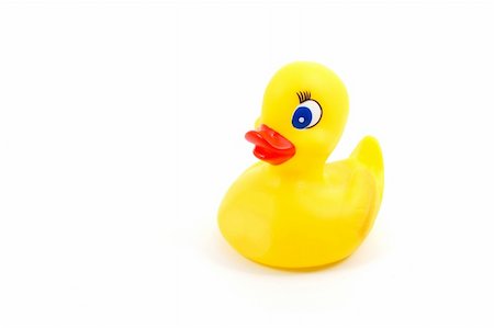 isolated toy rubber duck for playing in the bathroom Stock Photo - Budget Royalty-Free & Subscription, Code: 400-04270729