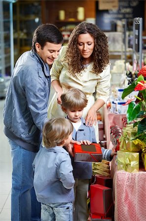 simsearch:400-04323202,k - Happy family with children choose gifts Stock Photo - Budget Royalty-Free & Subscription, Code: 400-04271157