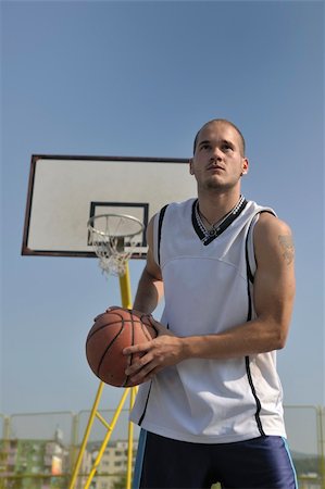 basketball player practicing and posing for basketball and sports athlete concept Stock Photo - Budget Royalty-Free & Subscription, Code: 400-04271418