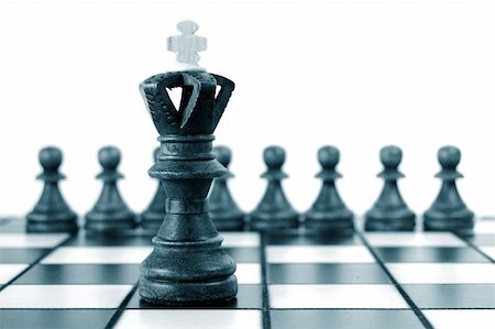 simsearch:400-04775983,k - chess pieces on chess board showing concept for success and power Stock Photo - Budget Royalty-Free & Subscription, Code: 400-04271635