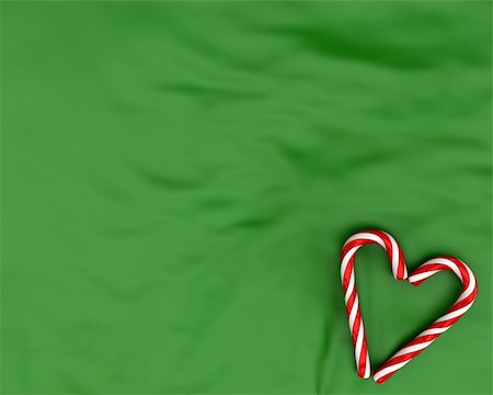 simsearch:400-05008640,k - Heart made from christmas candies on green fabric background Photographie de stock - Aubaine LD & Abonnement, Code: 400-04271654