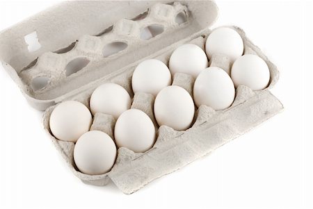 simsearch:400-04333980,k - Eggs at the box isolated on a white background Foto de stock - Super Valor sin royalties y Suscripción, Código: 400-04271983