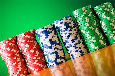simsearch:400-04382425,k - Stack of casino chips against gradient background Stock Photo - Budget Royalty-Free & Subscription, Code: 400-04273322