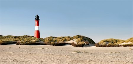 Panorama of a german lighthouse at the beach Stock Photo - Budget Royalty-Free & Subscription, Code: 400-04273567